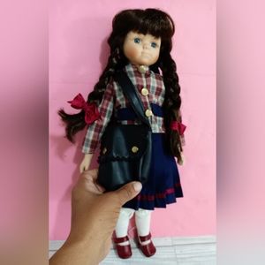 Vintage Porcelain doll student with bag country.
